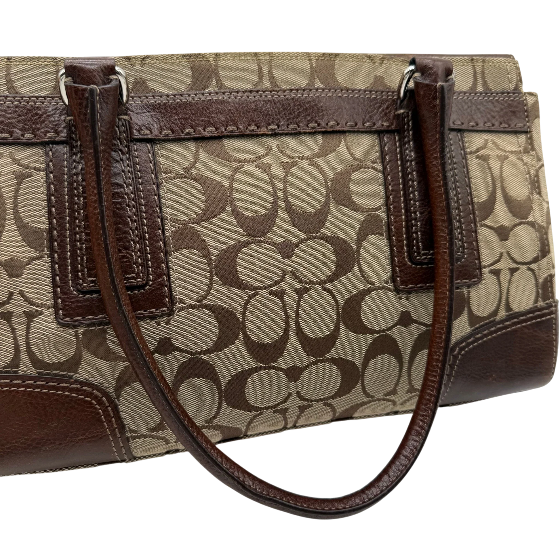 https://cdn.shopify.com/s/files/1/0564/9376/8855/files/coach-handtasche-tote-signature-beige-braun-large-canvas-vintage-y2k-look34.webp?v=1777462770