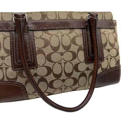 https://cdn.shopify.com/s/files/1/0564/9376/8855/files/coach-handtasche-tote-signature-beige-braun-large-canvas-vintage-y2k-look34.webp?v=1777462770
