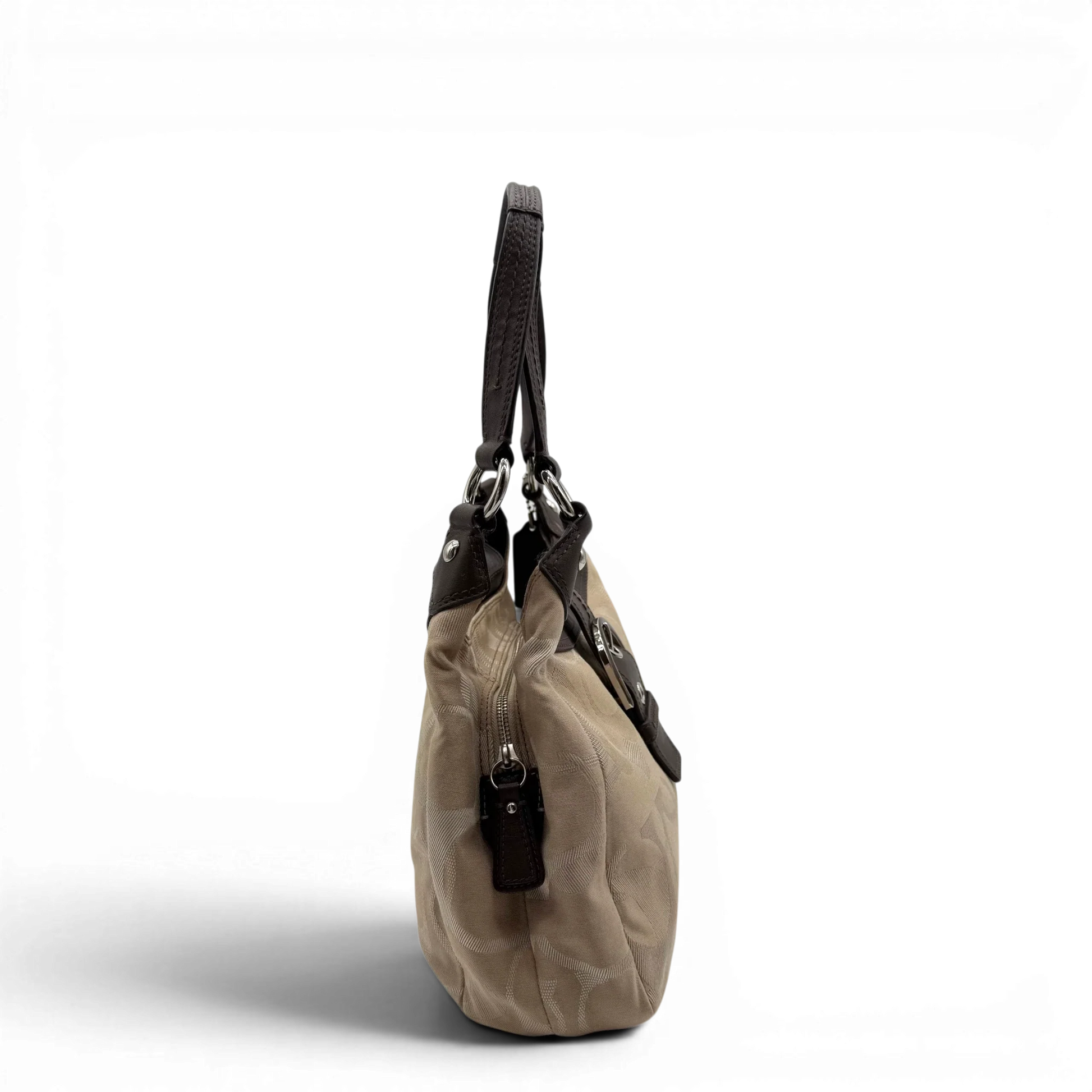 https://cdn.shopify.com/s/files/1/0564/9376/8855/files/coach-shopper-signature-beige-premium-handbag-chic-canvas-logo-style43.webp?v=1777464009