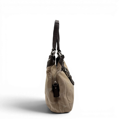 https://cdn.shopify.com/s/files/1/0564/9376/8855/files/coach-shopper-signature-beige-premium-handbag-chic-canvas-logo-style43.webp?v=1777464009