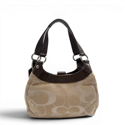 https://cdn.shopify.com/s/files/1/0564/9376/8855/files/coach-shopper-signature-beige-premium-handbag-chic-canvas-logo-style45.webp?v=1777464010