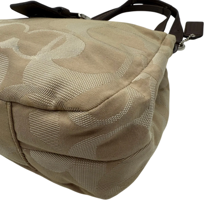 https://cdn.shopify.com/s/files/1/0564/9376/8855/files/coach-shopper-signature-beige-premium-handbag-chic-canvas-logo-style48.webp?v=1777464010