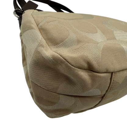 https://cdn.shopify.com/s/files/1/0564/9376/8855/files/coach-shopper-signature-beige-premium-handbag-chic-canvas-logo-style49.webp?v=1777464010