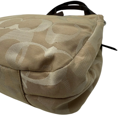 https://cdn.shopify.com/s/files/1/0564/9376/8855/files/coach-shopper-signature-beige-premium-handbag-chic-canvas-logo-style50.webp?v=1777464010