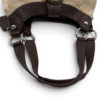 https://cdn.shopify.com/s/files/1/0564/9376/8855/files/coach-shopper-signature-beige-premium-handbag-chic-canvas-logo-style51.webp?v=1777464010