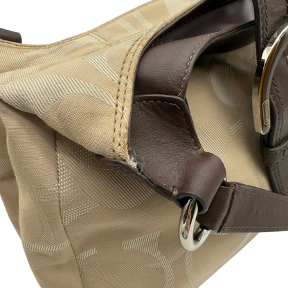 https://cdn.shopify.com/s/files/1/0564/9376/8855/files/coach-shopper-signature-beige-premium-handbag-chic-canvas-logo-style59.webp?v=1777464010