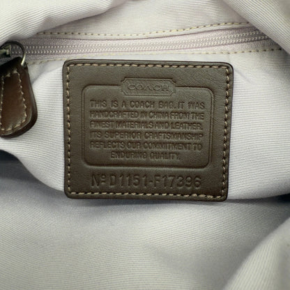 https://cdn.shopify.com/s/files/1/0564/9376/8855/files/coach-shopper-signature-beige-premium-handbag-chic-canvas-logo-style69.webp?v=1777464010