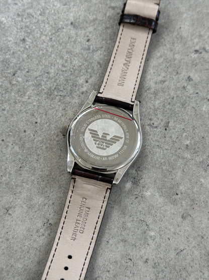 Emporio Armani leather quartz watch from the 2000s with a sleek round dial and leather strap, showcasing elegant vintage design.
