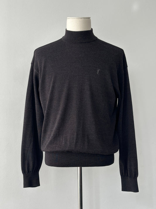 Yves Saint Laurent 1990s wool high neck jumper in size M, featuring a classic high neckline and textured knit fabric.