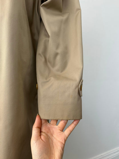 Burberry 1990s pure cotton high neck trench coat in beige, front view showing classic collar and belted waist.