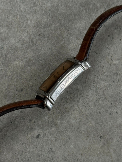 Emporio Armani 2000s leather watch with a classic round dial and black leather strap, showcasing elegant design and brand logo.