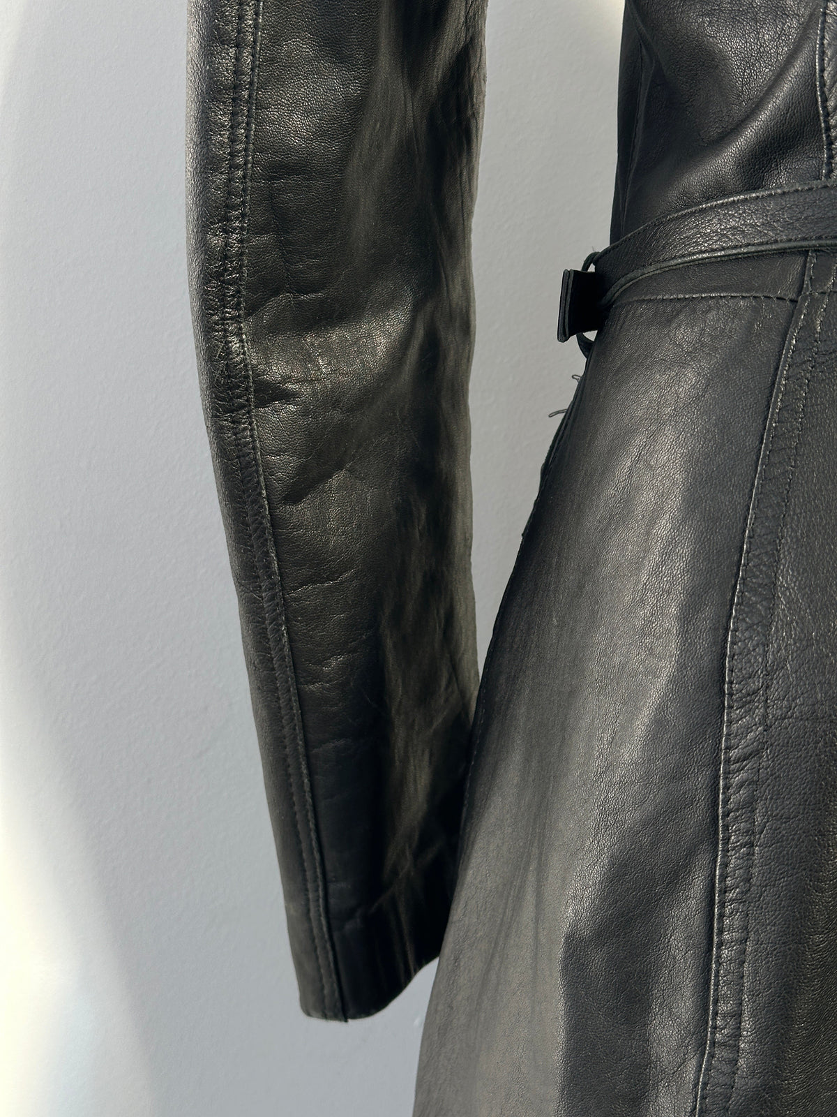 Vintage Italian 1990s double zip belted leather jacket, XS, featuring classic design and textured leather in the image.