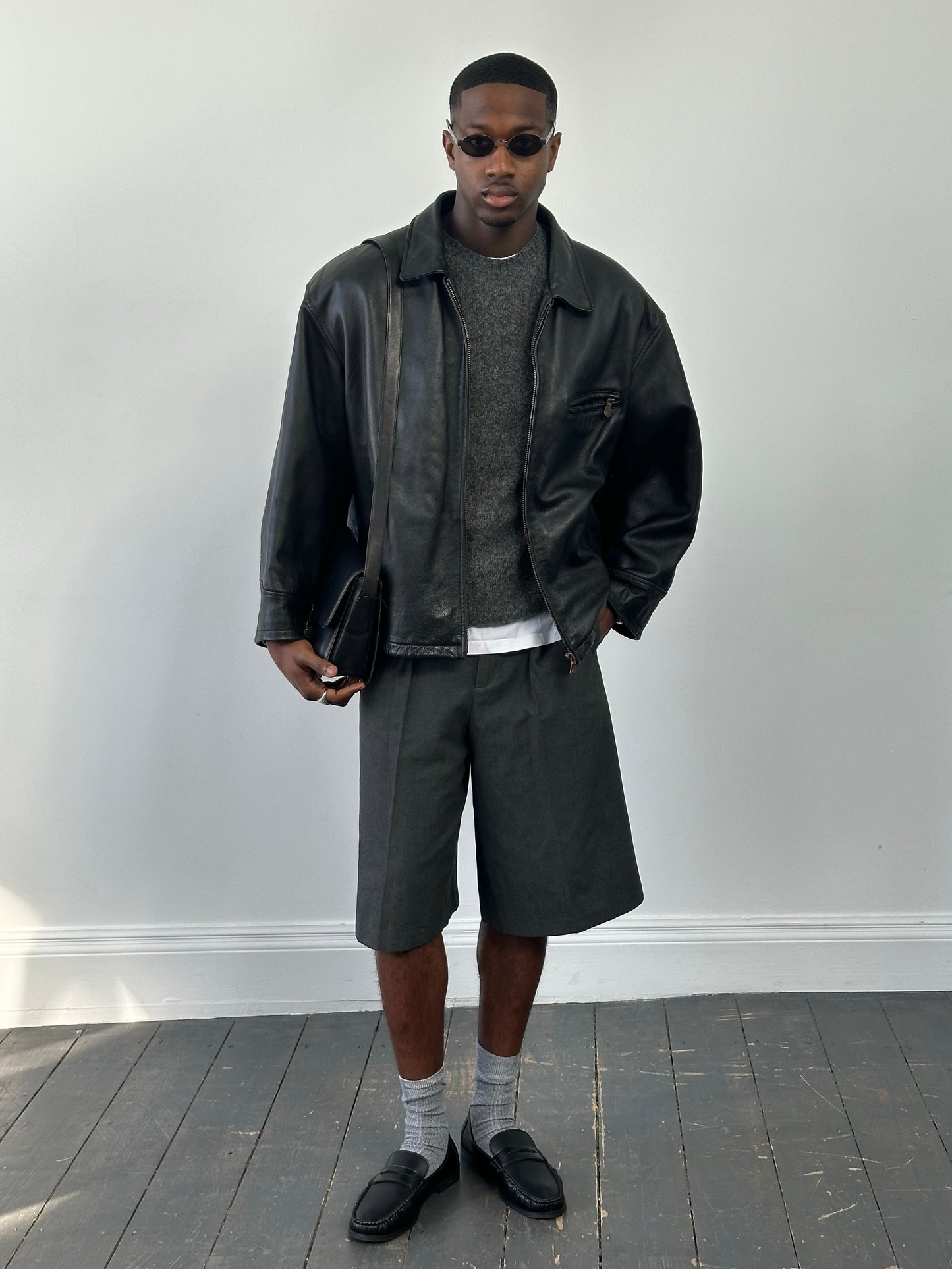 Vintage 1990s heavyweight leather jacket in black, minimal design, sized XXL, made by Vintage brand.