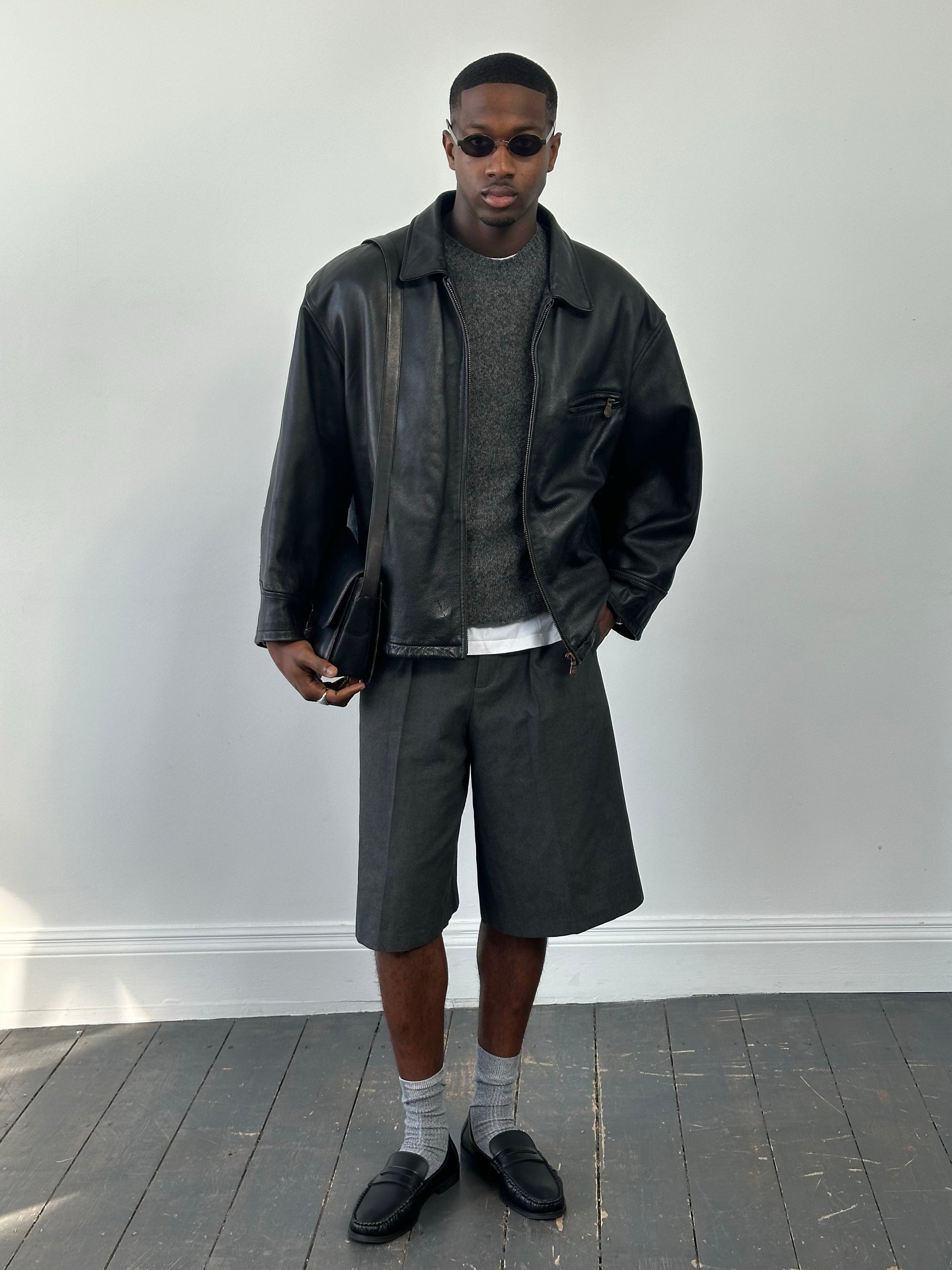 Vintage 1990s heavyweight leather jacket in black, minimal design, sized XXL, made by Vintage brand.