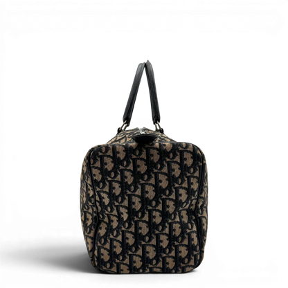 https://cdn.shopify.com/s/files/1/0564/9376/8855/files/dior_boston_30_vintage_monogram_beige_christian_dior_oblique_boston_bag_vintage_dior_handtasche_canvas_beige1768.webp?v=1779406963