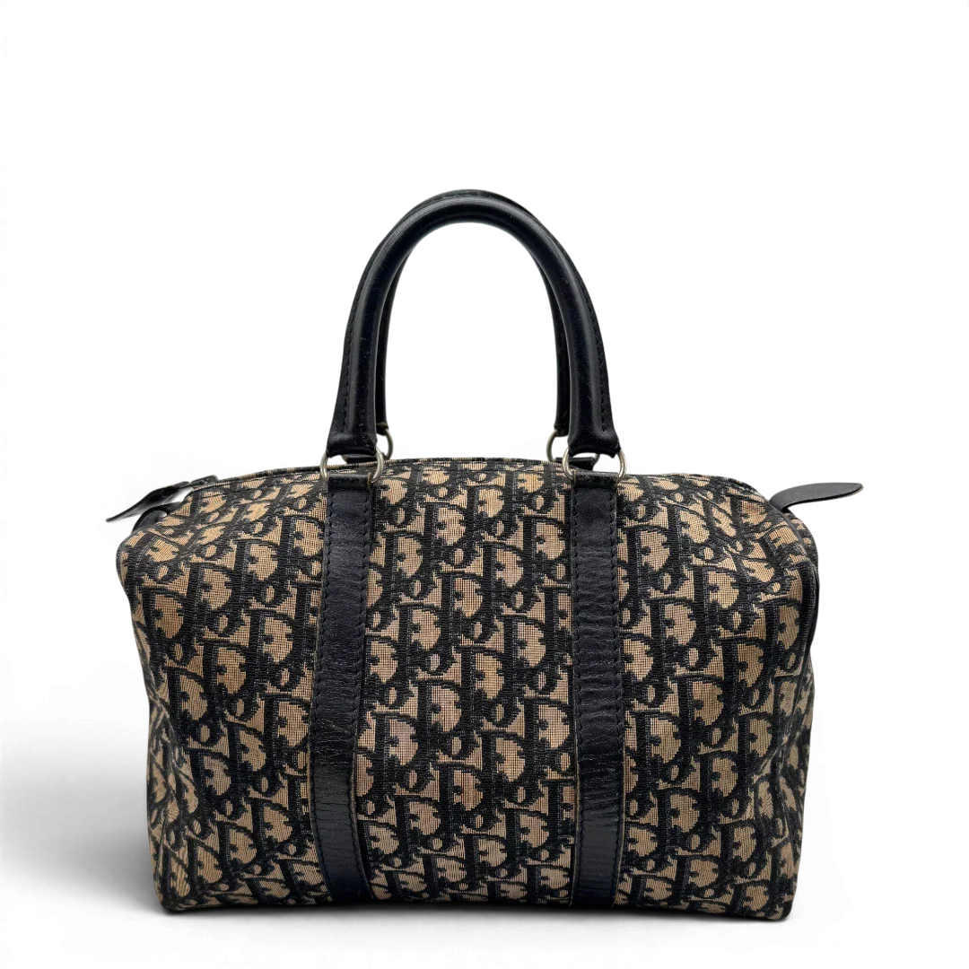 https://cdn.shopify.com/s/files/1/0564/9376/8855/files/dior_boston_30_vintage_monogram_beige_christian_dior_oblique_boston_bag_vintage_dior_handtasche_canvas_beige1770.webp?v=1779406963
