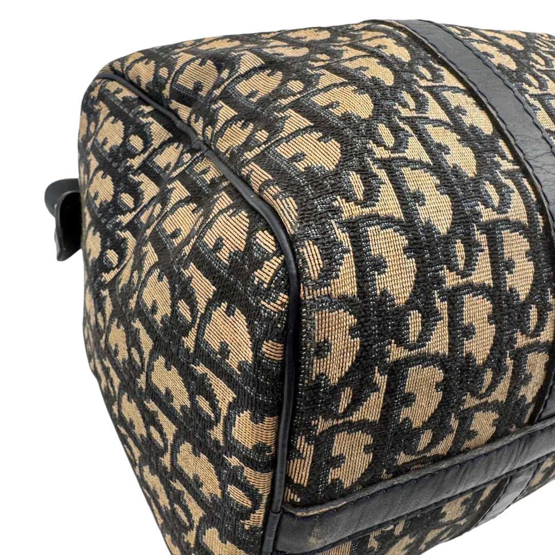 https://cdn.shopify.com/s/files/1/0564/9376/8855/files/dior_boston_30_vintage_monogram_beige_christian_dior_oblique_boston_bag_vintage_dior_handtasche_canvas_beige1772.webp?v=1779406964