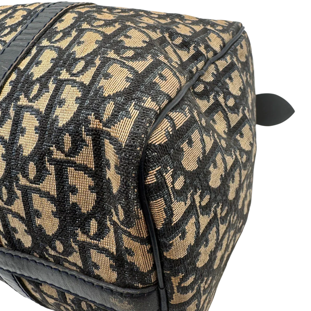 https://cdn.shopify.com/s/files/1/0564/9376/8855/files/dior_boston_30_vintage_monogram_beige_christian_dior_oblique_boston_bag_vintage_dior_handtasche_canvas_beige1773.webp?v=1779406964