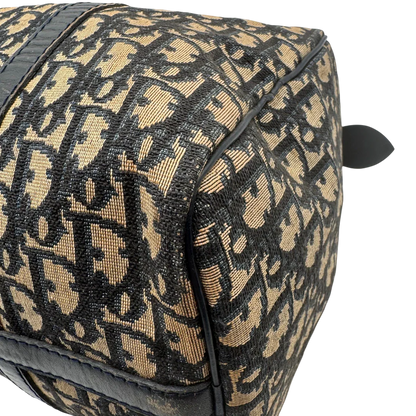 https://cdn.shopify.com/s/files/1/0564/9376/8855/files/dior_boston_30_vintage_monogram_beige_christian_dior_oblique_boston_bag_vintage_dior_handtasche_canvas_beige1773.webp?v=1779406964