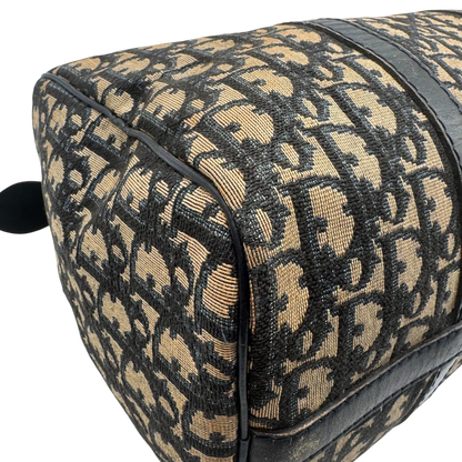 https://cdn.shopify.com/s/files/1/0564/9376/8855/files/dior_boston_30_vintage_monogram_beige_christian_dior_oblique_boston_bag_vintage_dior_handtasche_canvas_beige1774.webp?v=1779406964