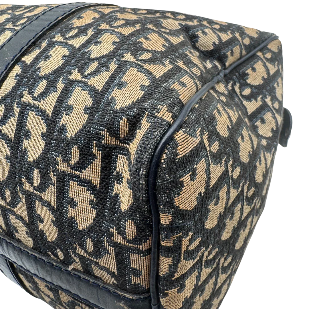https://cdn.shopify.com/s/files/1/0564/9376/8855/files/dior_boston_30_vintage_monogram_beige_christian_dior_oblique_boston_bag_vintage_dior_handtasche_canvas_beige1775.webp?v=1779406964