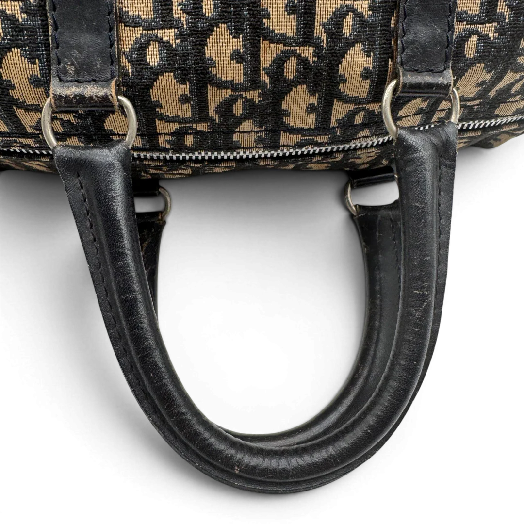 https://cdn.shopify.com/s/files/1/0564/9376/8855/files/dior_boston_30_vintage_monogram_beige_christian_dior_oblique_boston_bag_vintage_dior_handtasche_canvas_beige1776.webp?v=1779406964