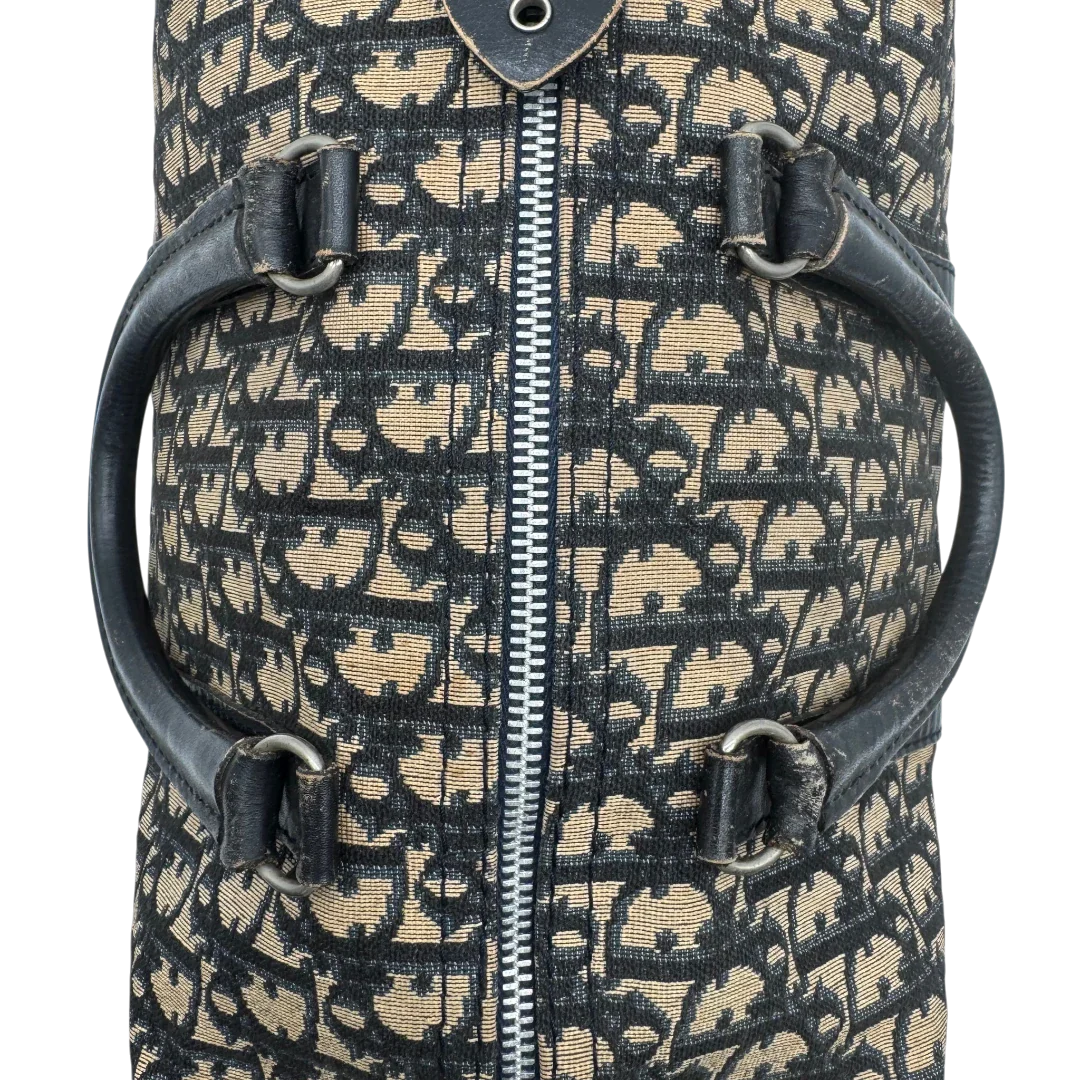 https://cdn.shopify.com/s/files/1/0564/9376/8855/files/dior_boston_30_vintage_monogram_beige_christian_dior_oblique_boston_bag_vintage_dior_handtasche_canvas_beige1780.webp?v=1779406964