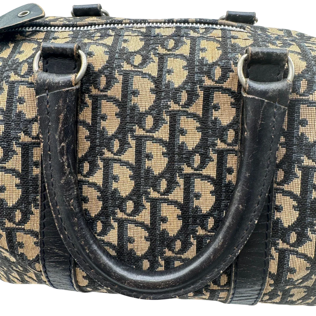 https://cdn.shopify.com/s/files/1/0564/9376/8855/files/dior_boston_30_vintage_monogram_beige_christian_dior_oblique_boston_bag_vintage_dior_handtasche_canvas_beige1781.webp?v=1779406964