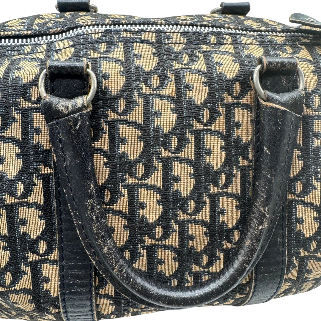https://cdn.shopify.com/s/files/1/0564/9376/8855/files/dior_boston_30_vintage_monogram_beige_christian_dior_oblique_boston_bag_vintage_dior_handtasche_canvas_beige1782.webp?v=1779406964