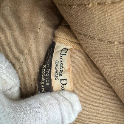 https://cdn.shopify.com/s/files/1/0564/9376/8855/files/dior_boston_30_vintage_monogram_beige_christian_dior_oblique_boston_bag_vintage_dior_handtasche_canvas_beige1785.webp?v=1779406964
