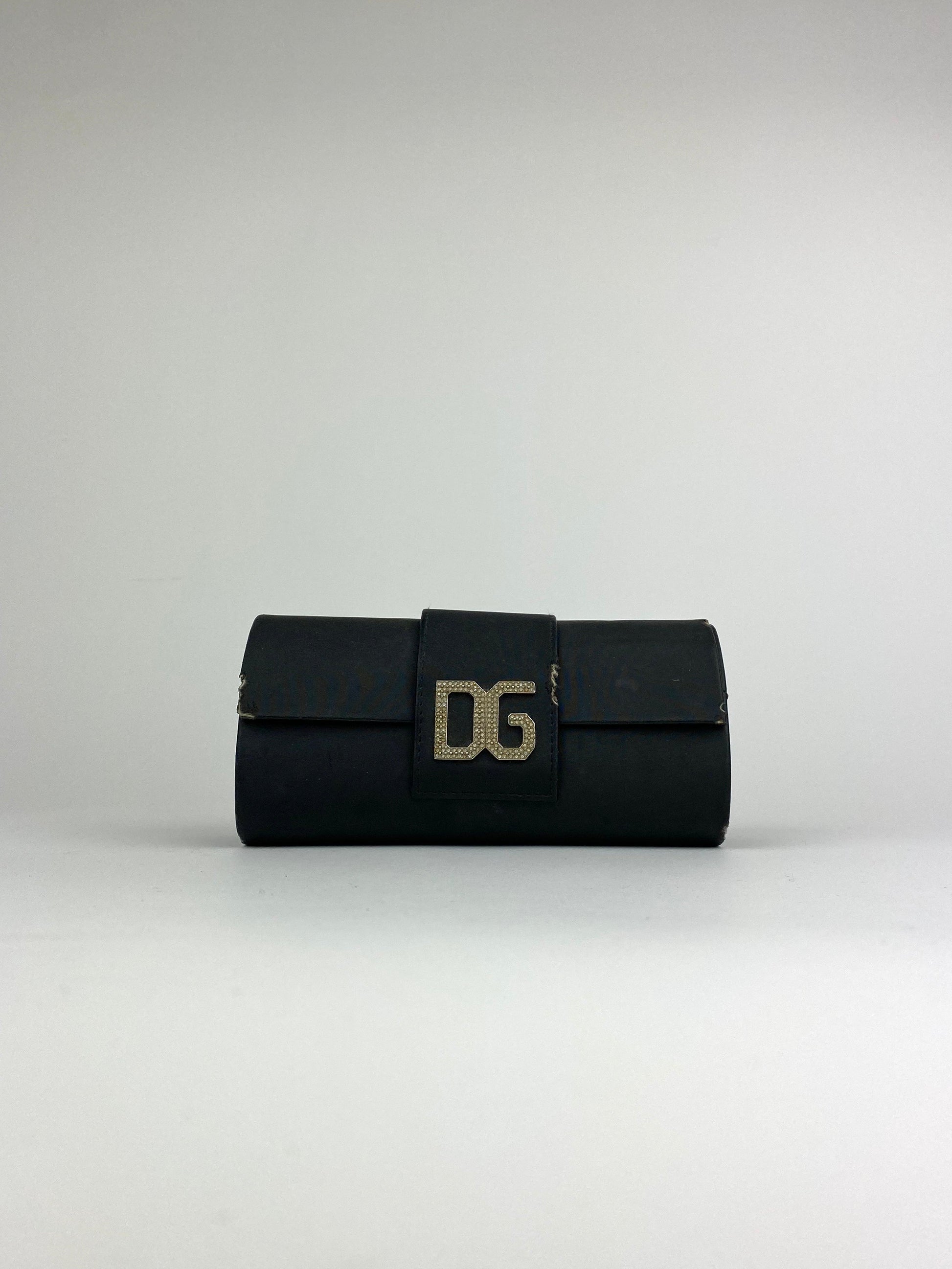 Blue Dolce & Gabbana Shield sunglasses with large, curved lenses and sleek frame, stylishly displayed.