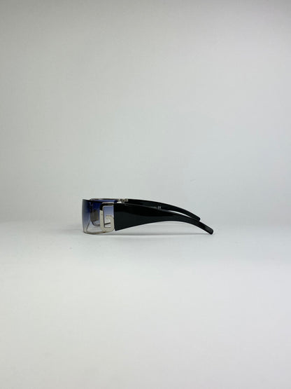 Blue Dolce & Gabbana Shield sunglasses with oversized frame and dark tinted lenses, stylish and fashionable eyewear.