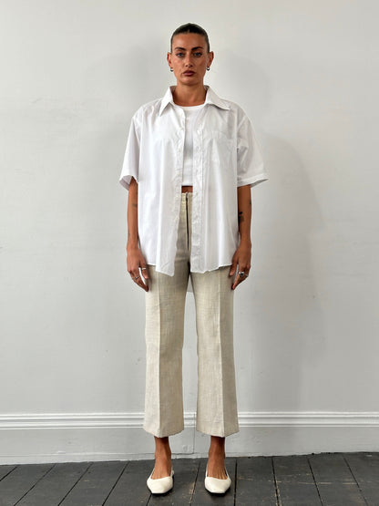 Vintage 1990s linen high waist cropped trousers, size W26, featuring a relaxed fit and classic high-rise style.