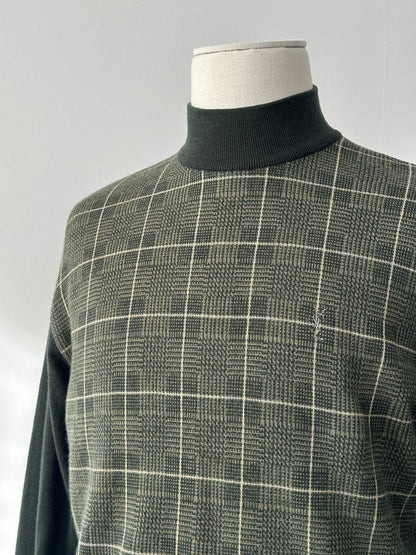Yves Saint Laurent 1990s pure wool check high-neck jumper in black, white, and red, featuring a classic plaid pattern and high collar.