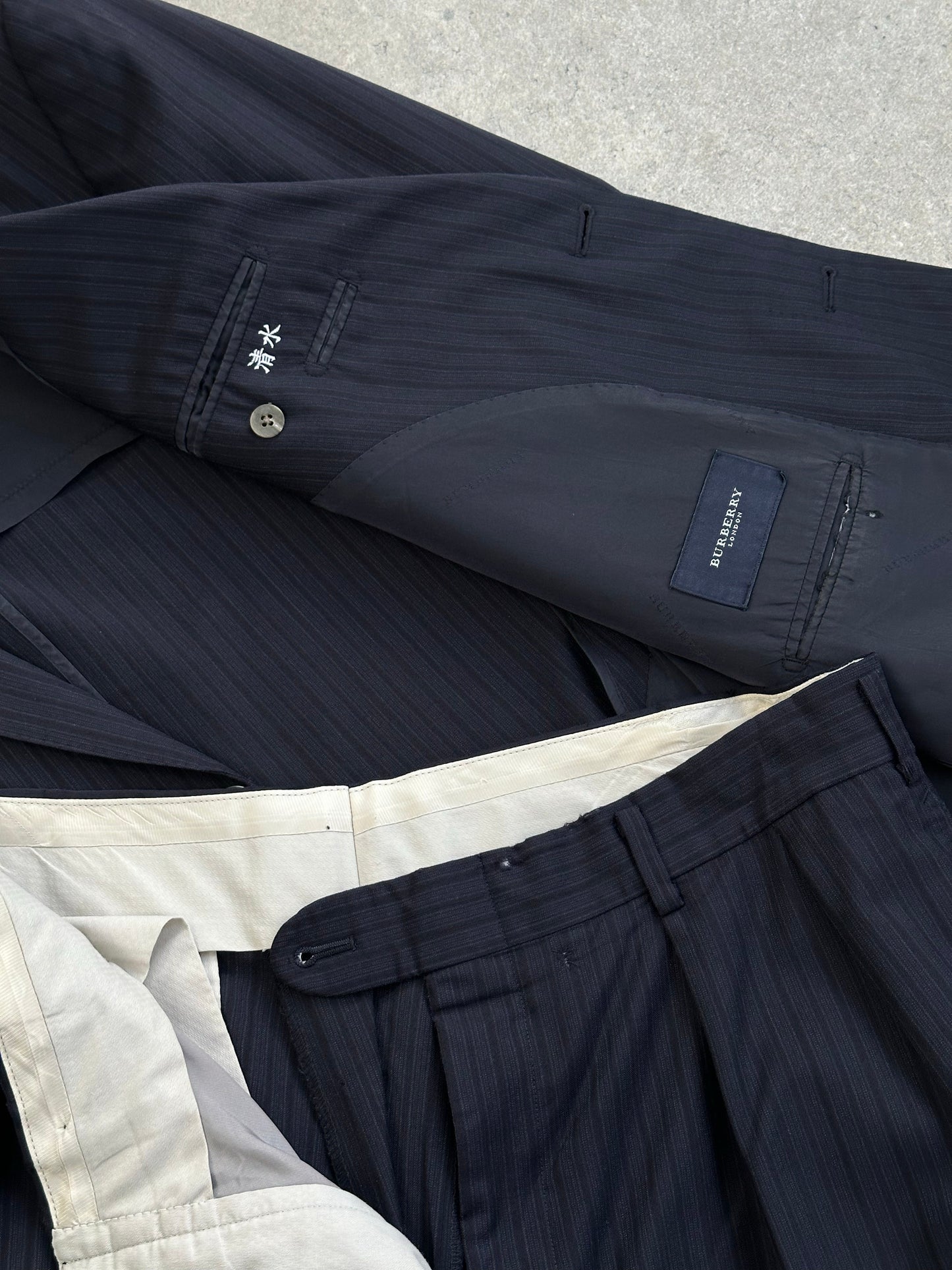 Burberry London 1990s pure wool striped suit with tailored blazer and matching trousers, size 42S/W34.