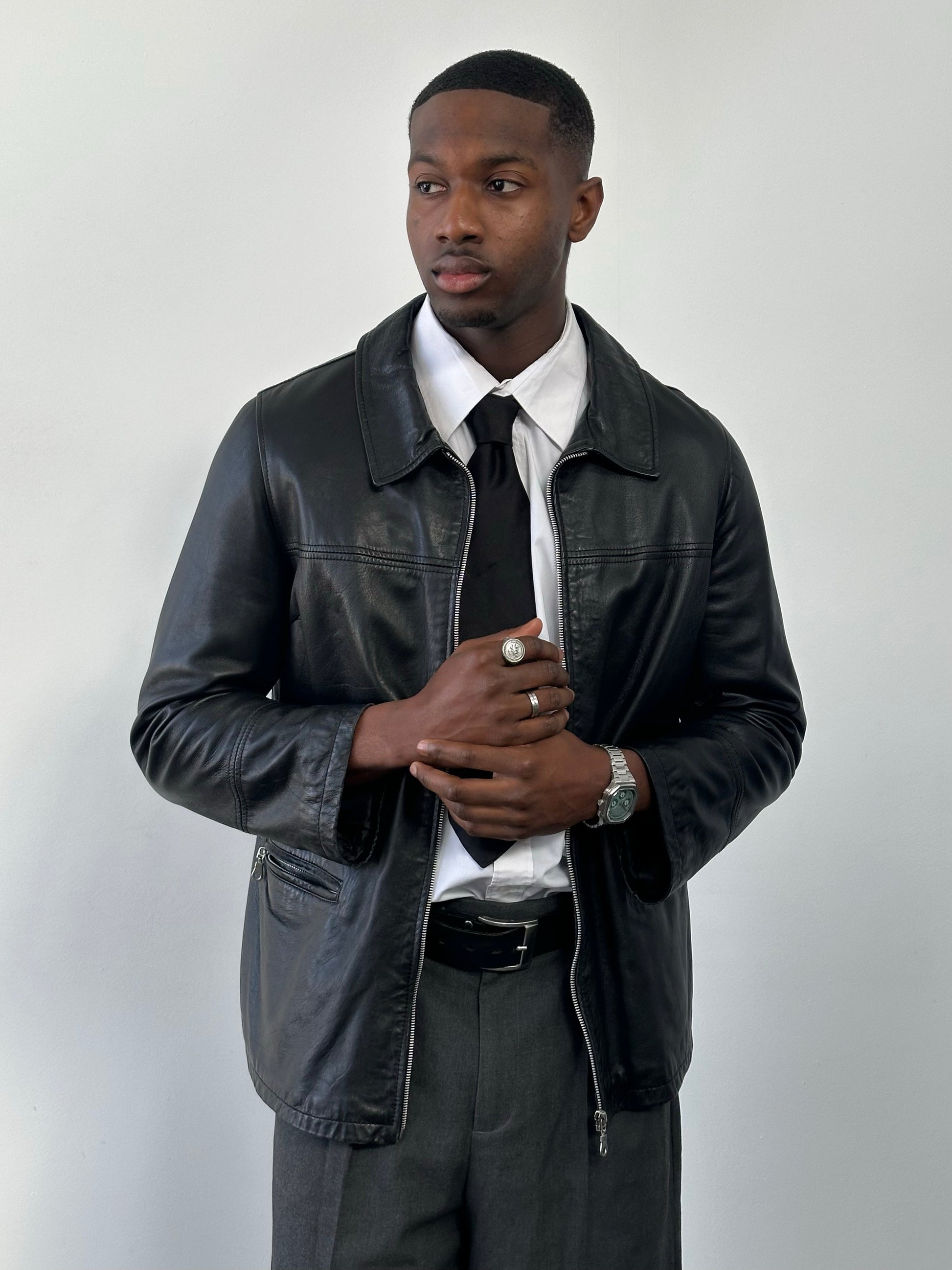 Vintage Italian 1990s leather boxy jacket in brown with classic collar and front pockets, size M, showcasing timeless style.