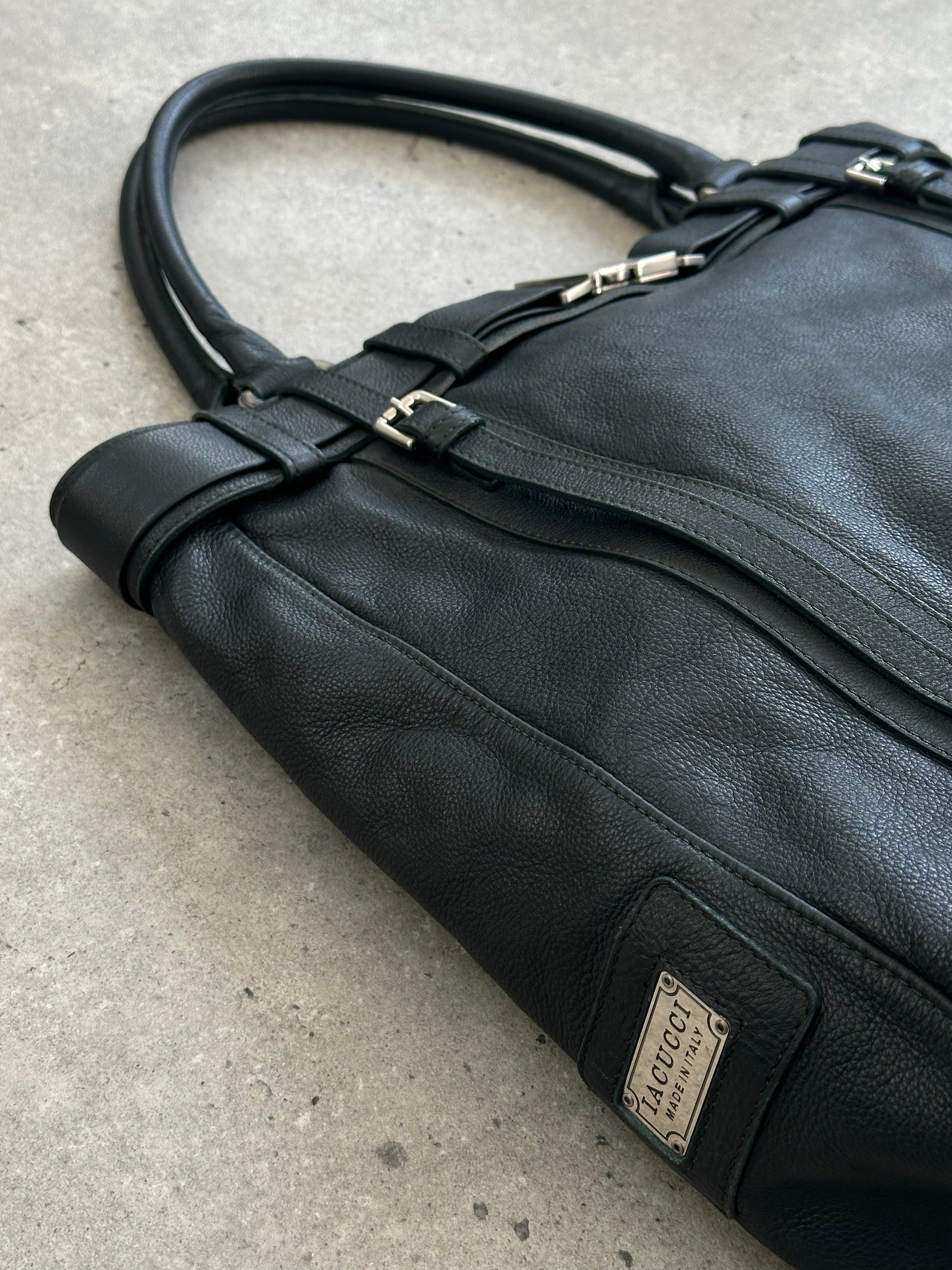 Vintage Italian leather shoulder bag with buckle closure, 2000s style, featuring a classic and timeless design.