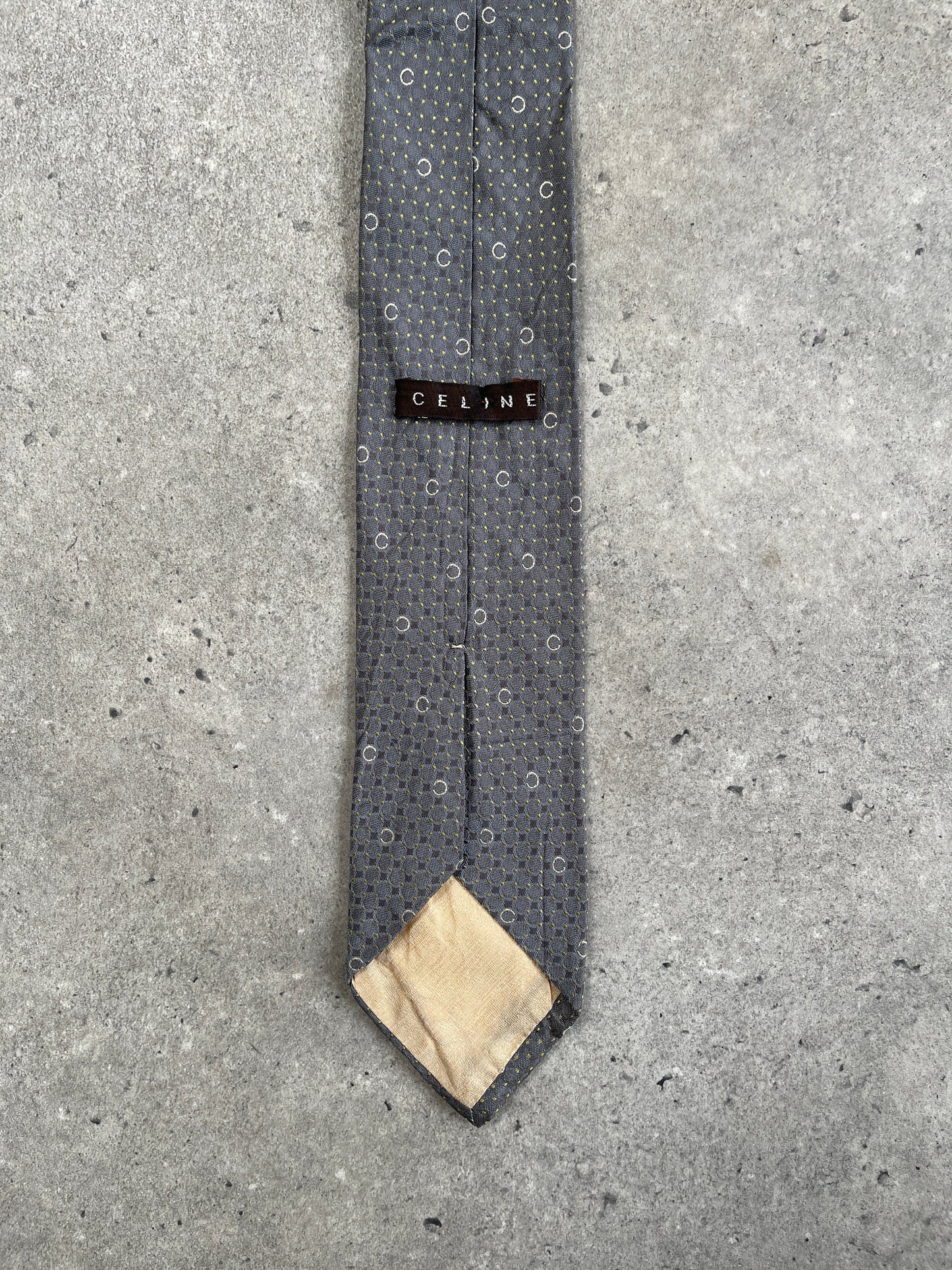 Celine 1990s pure silk woven monogram tie featuring intricate pattern and elegant craftsmanship.