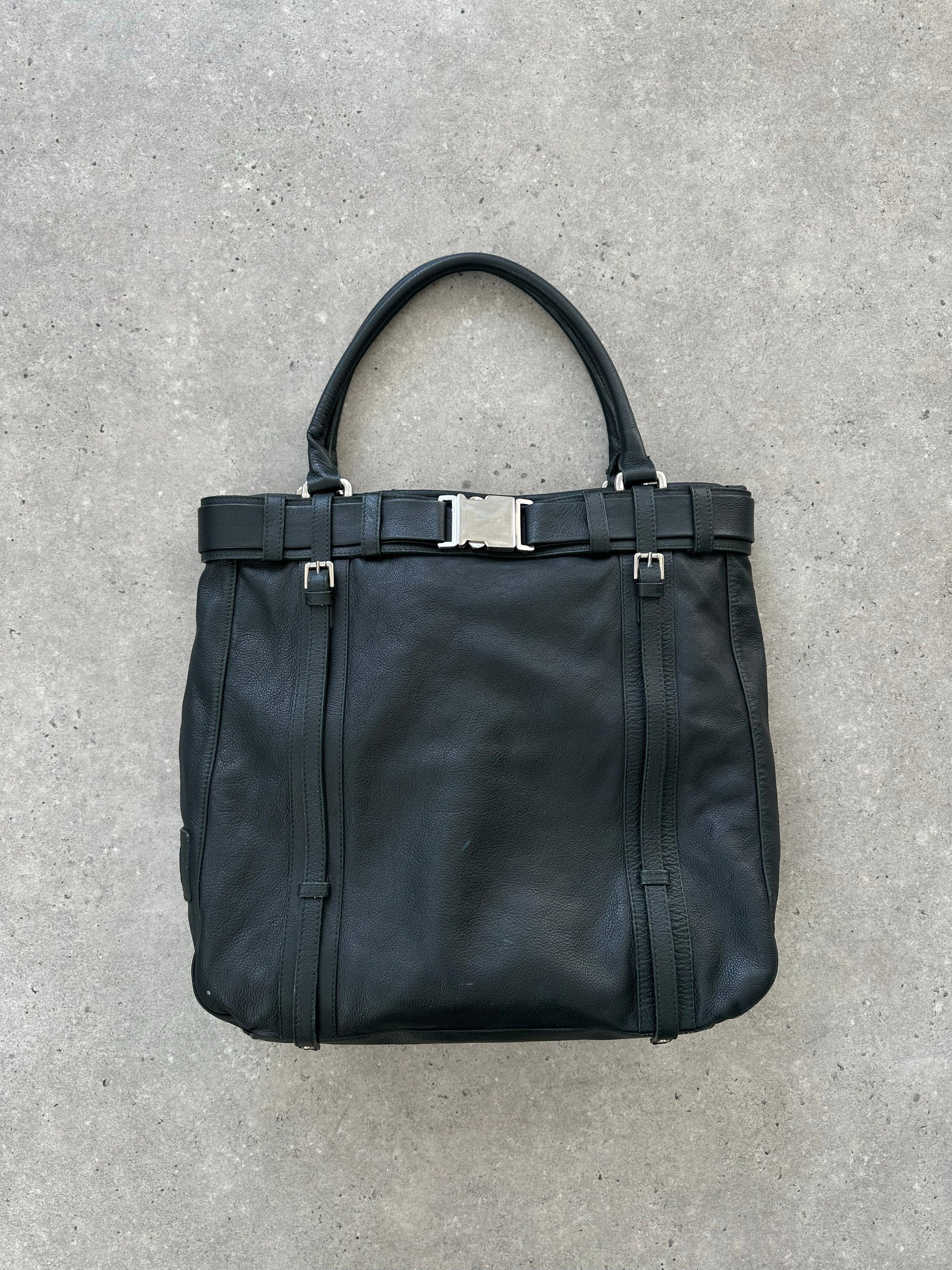 Vintage Italian 2000s leather shoulder bag with buckle detail, showcasing classic craftsmanship and stylish design.