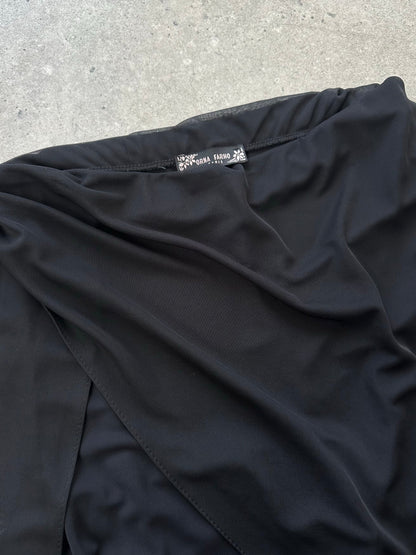 Vintage French 1990s sheer overlay wide-leg trousers in W28, featuring flowy fabric and high-waisted design.