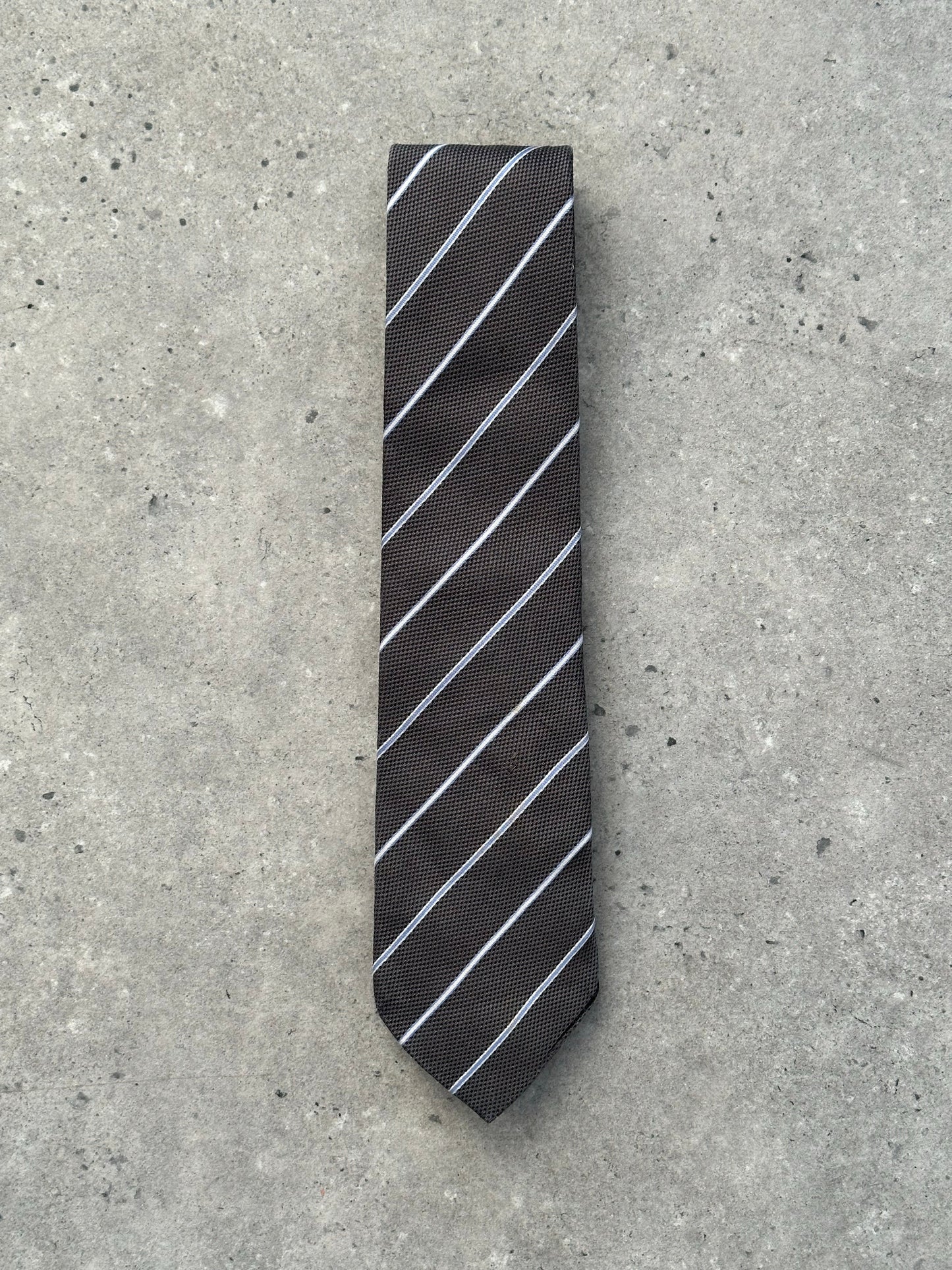 Burberry Black Label 2000s pure silk striped tie with classic design, featuring bold black and white pattern, stylish accessory for formal wear.