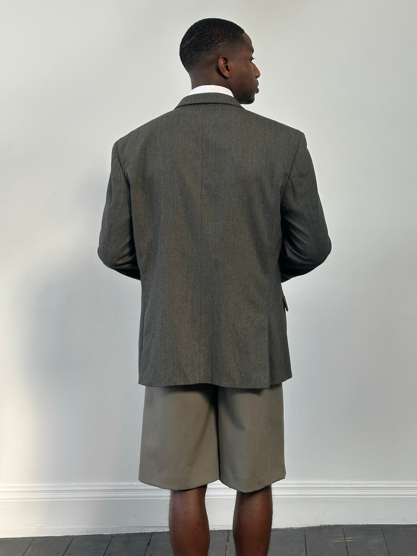 Yves Saint Laurent men's 1990s pure wool single-breasted blazer size 46R, dark tailored blazer with notch lapels and structured fit.