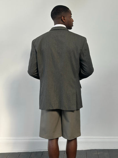 Yves Saint Laurent men's 1990s pure wool single-breasted blazer size 46R, dark tailored blazer with notch lapels and structured fit.