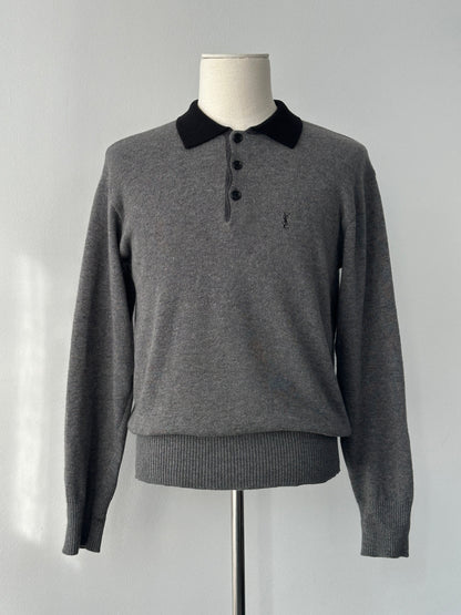Yves Saint Laurent 1990s wool polo jumper in black, size S-M, featuring a classic collar and ribbed cuffs.