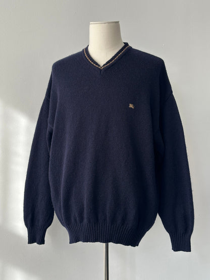 Burberry 1990s pure wool V-neck jumper in XL, showing the classic beige color and fine knit texture.