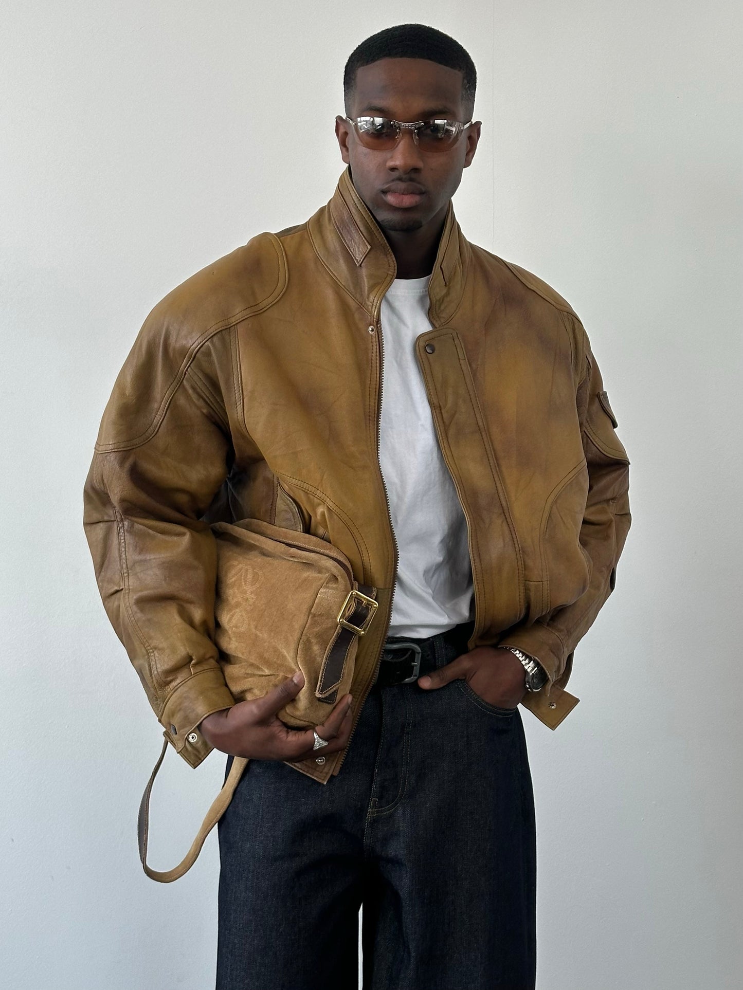 Vintage 1990s leather high neck bomber jacket, men's size L, featuring classic design and rich leather texture.