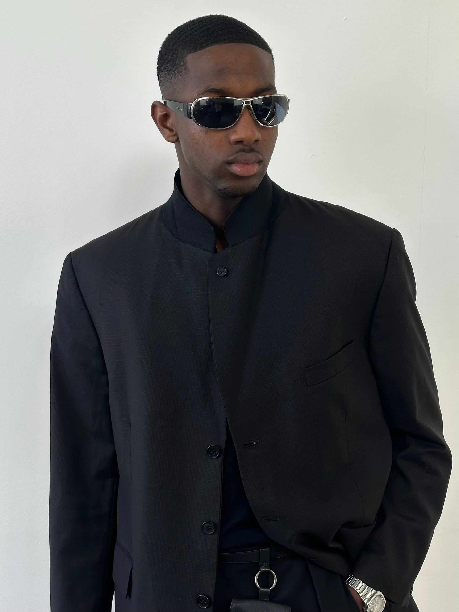 Yves Saint Laurent Pour Homme 1990s high neck wool blazer in size 48R, featuring a classic tailored fit and elegant design.