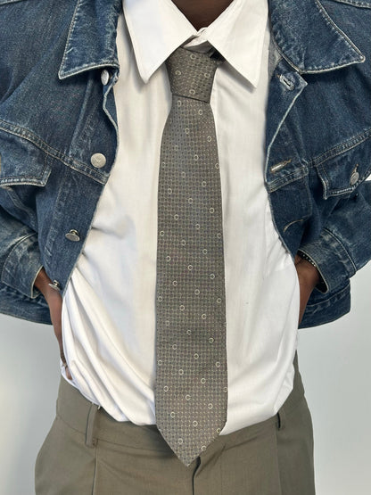 Celine 1990s pure silk woven monogram tie with intricate pattern and classic design, featuring the Celine logo and monogram details.