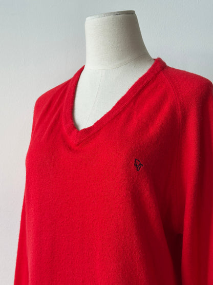 Christian Dior 1990s V-neck logo jumper in black, showing the front view with the iconic Dior logo on the chest.