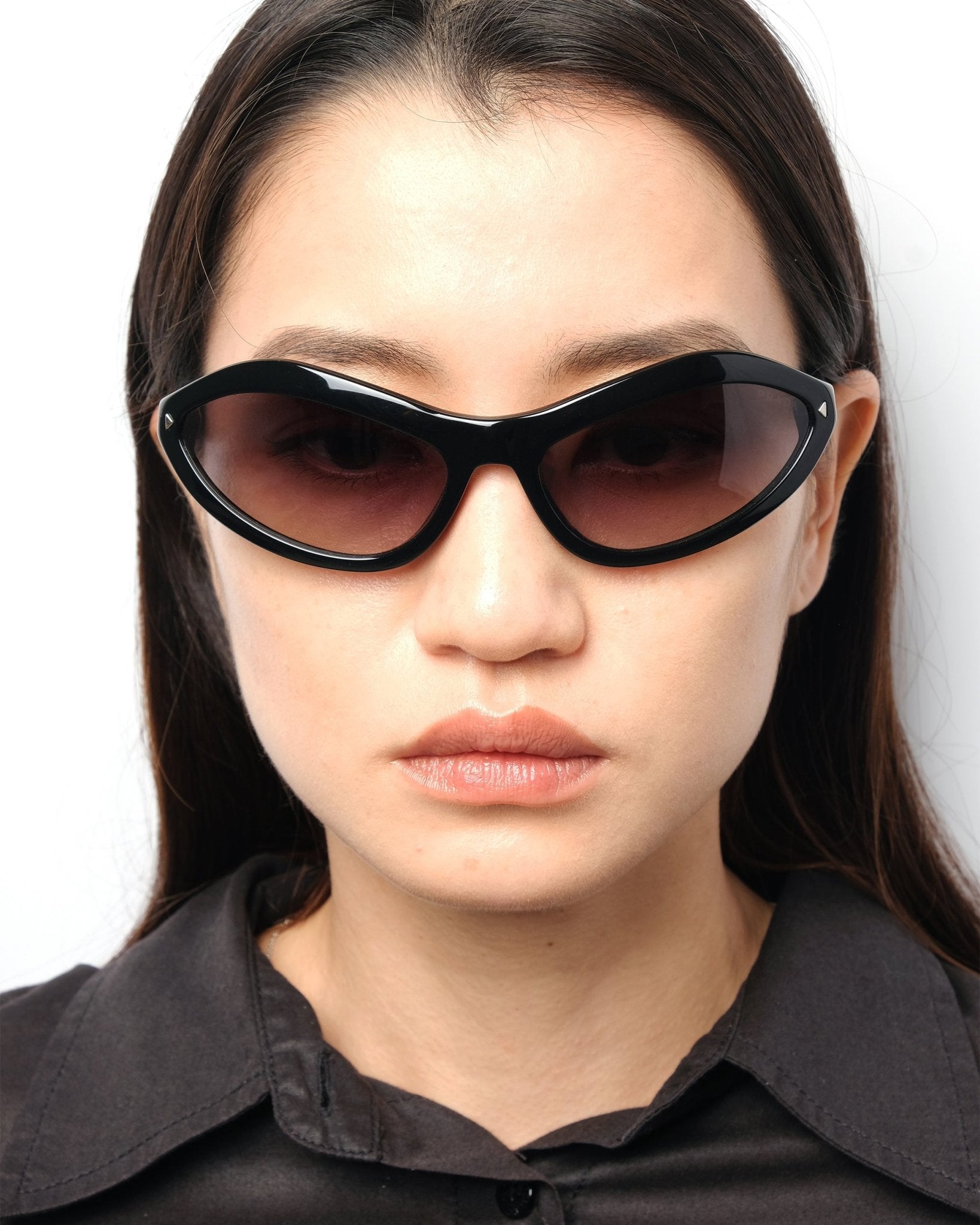 https://cdn.shopify.com/s/files/1/0818/5459/5398/files/fw2010-prada-cat-eye-631673.jpg?v=1749591728